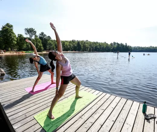 People Stretching on Dock at YMCA Wanakita